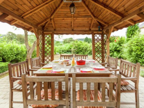 Отель Authentic village house with romantic garden and wooden gazebo  Комблен-О-Пон